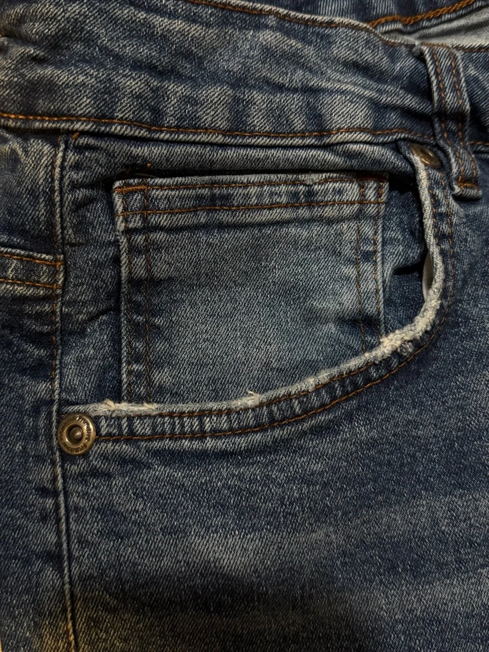 Primitive Brown Leather Patch on Blue Denim Jeans